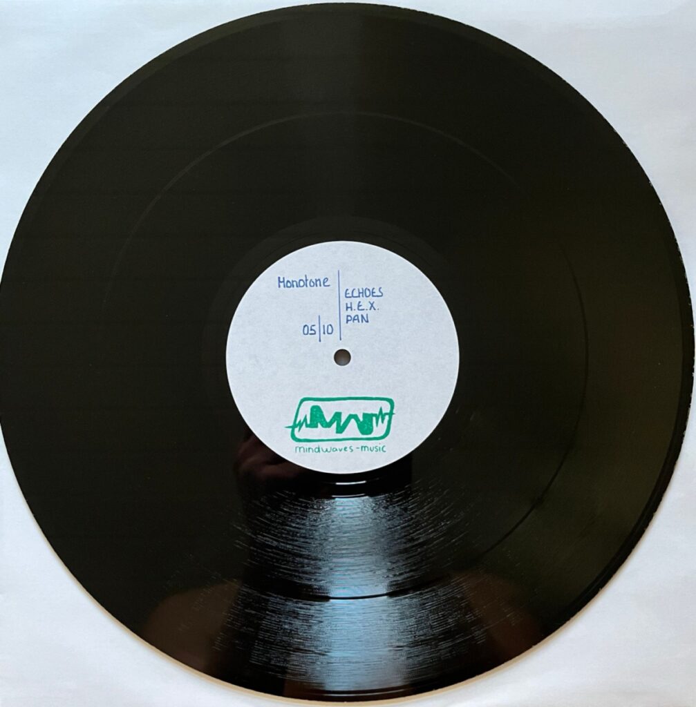 Monotone dubplate with the Mindwaves Music label, tracks Echoes, H.E.X. and PAN